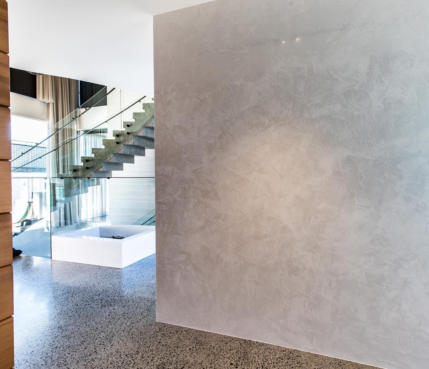 Marmorino polished stucco feature wall, wax finish